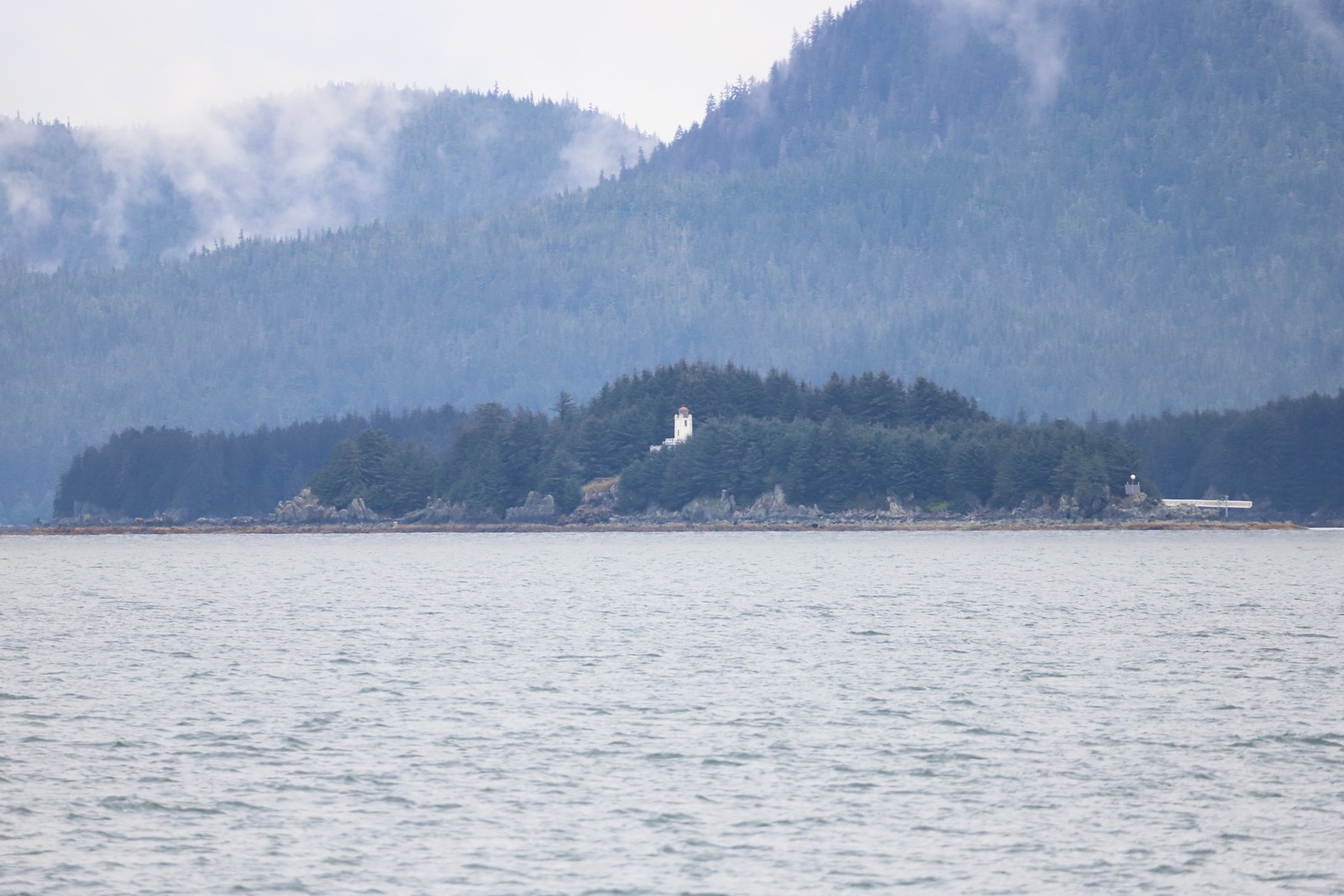 "Sentinel Island Lighthouse from the Whale Watching and Wildlife Quest Excursion - Visit to Juneau, Alaska on the Ovation of the Seas - Seven Night Alaska Experience Cruise - September 2nd-9th, 2022" by cseeman is licensed under CC BY-NC-SA 2.0. 